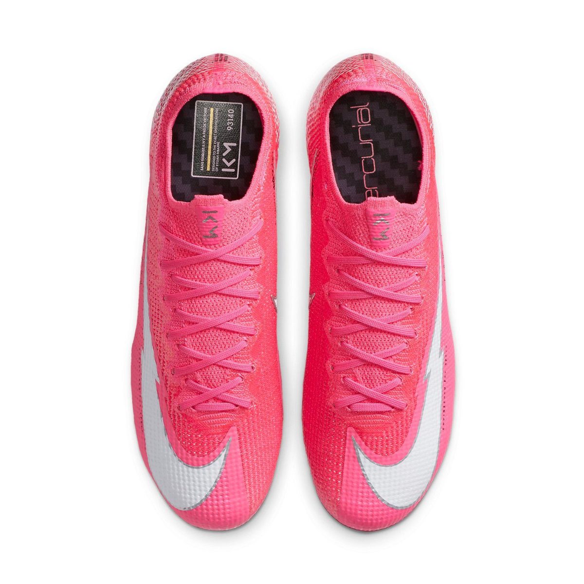 Top-down view of two bright pink athletic sneakers with laces tied, seen from above on a white background.