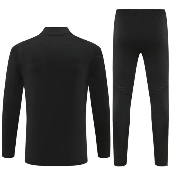 Back view of a black athletic jacket and matching jogger pants set, shown on a white background.