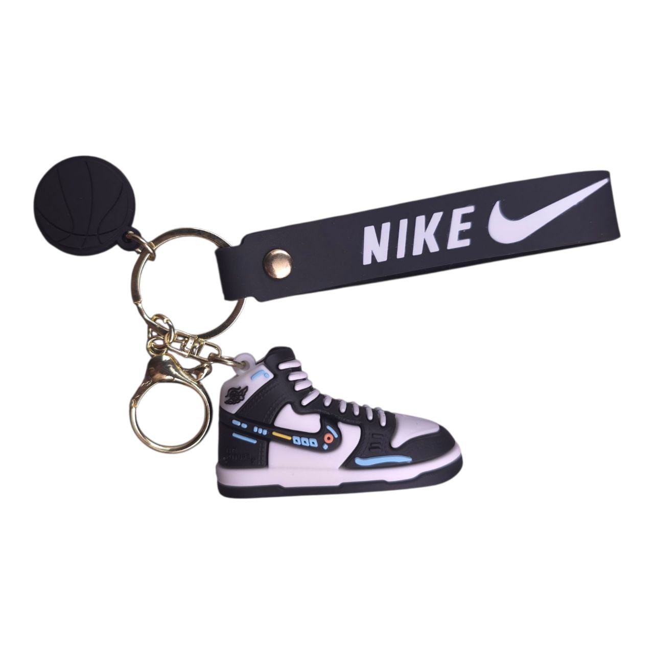 5805548633519671575 | UAE SPORT STORE Nike-branded keychain with a miniature sneaker charm and a black strap
