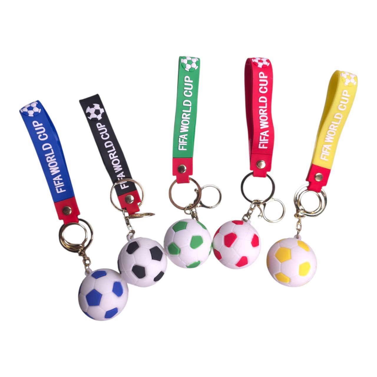 5805548633519671576 Five FIFA World Cup keychains with small soccer-ball charms and colorful straps (blue, black, green, red, yellow) on a white background.