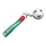 Keychain with a green strap reading FIFA WORLD CUP and a small soccer ball charm.
