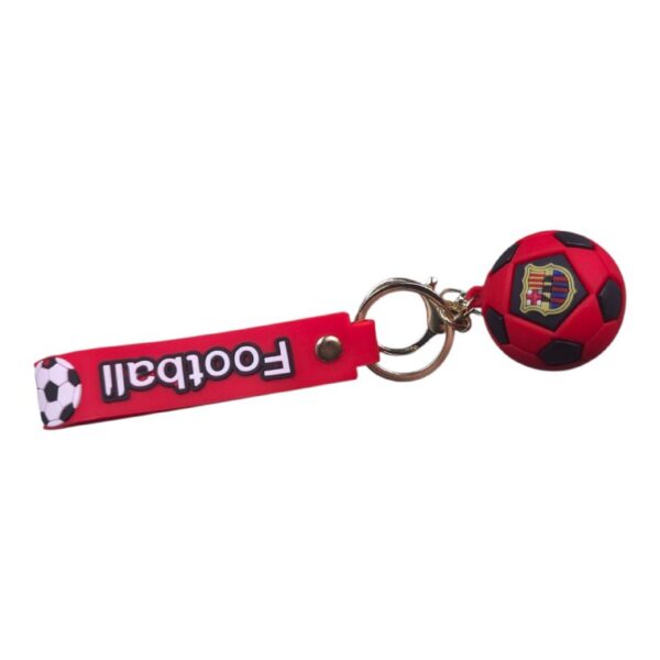 Red keychain with a red strap reading 'Football' and a small red-and-black soccer ball with a Barcelona crest