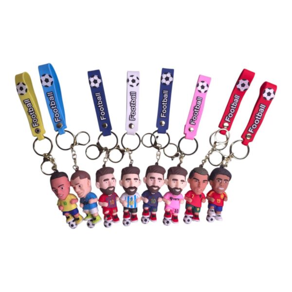 Colorful football (soccer) player keychains with smiling cartoon figures lined up, each attached to bright straps featuring a soccer ball motif and the word 'Football'.