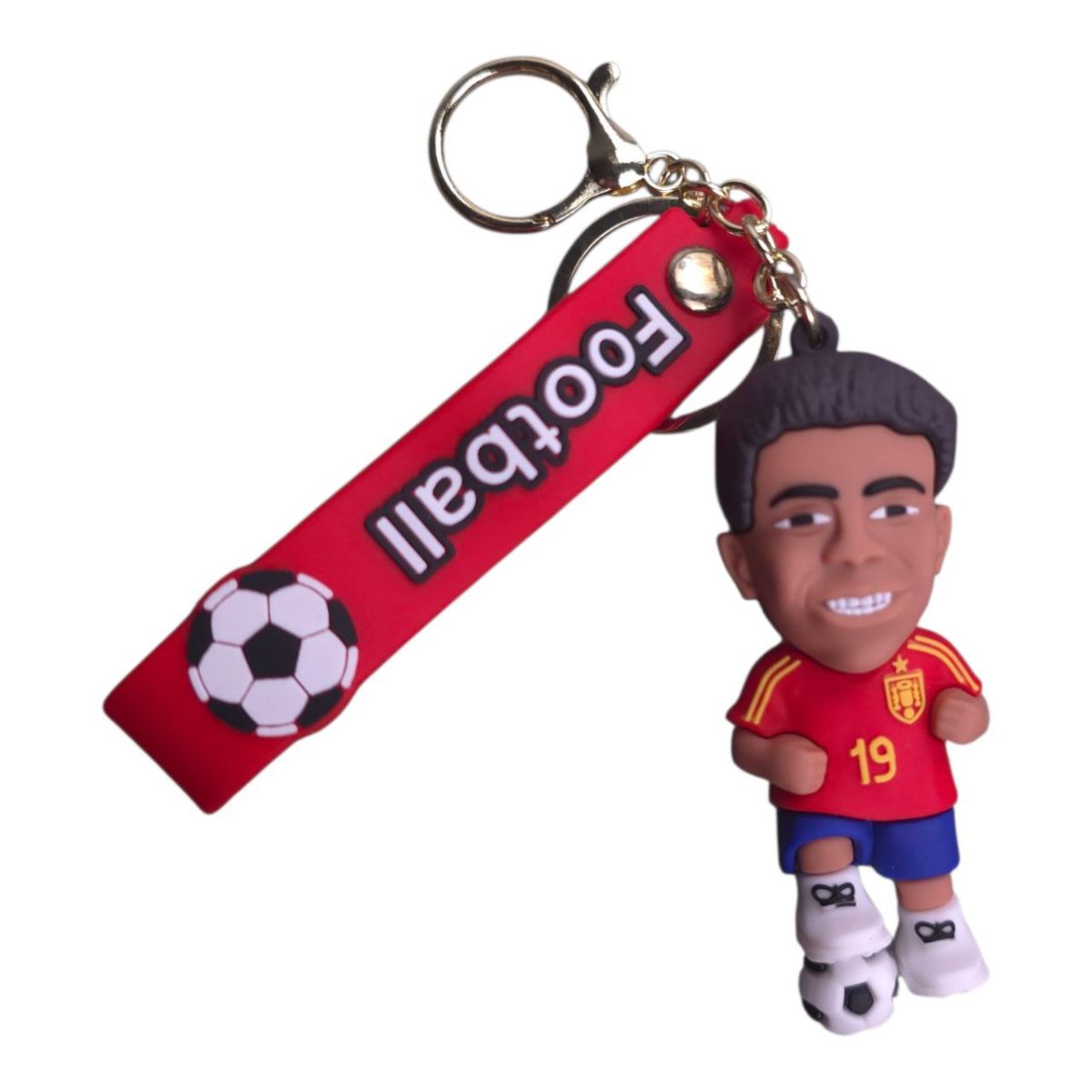 Soccer player keychain charm with red jersey (number 19) and white boots, attached to a red strap with a soccer ball graphic.