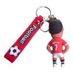 Keychain featuring a small footballer figure in a red Ronaldo jersey (number 7) and a red strap with a soccer ball graphic and the word football on it.