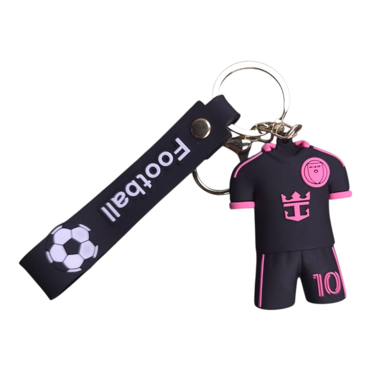 Miniature black-pink soccer player keychain wearing a jersey and shorts, attached to a navy lanyard with a soccer ball design.