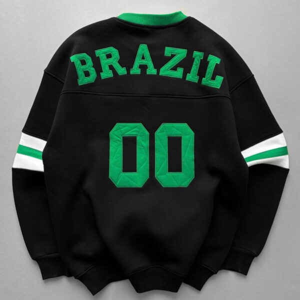 Back view of a black sweatshirt with bright green 'BRAZIL' letters and the number '00', green sleeve stripes, and green collar trim.