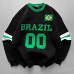 Black sweatshirt with Brazil flag patch, bold green 'BRAZIL' lettering, and green '00' on the front; green collar and striped sleeves.