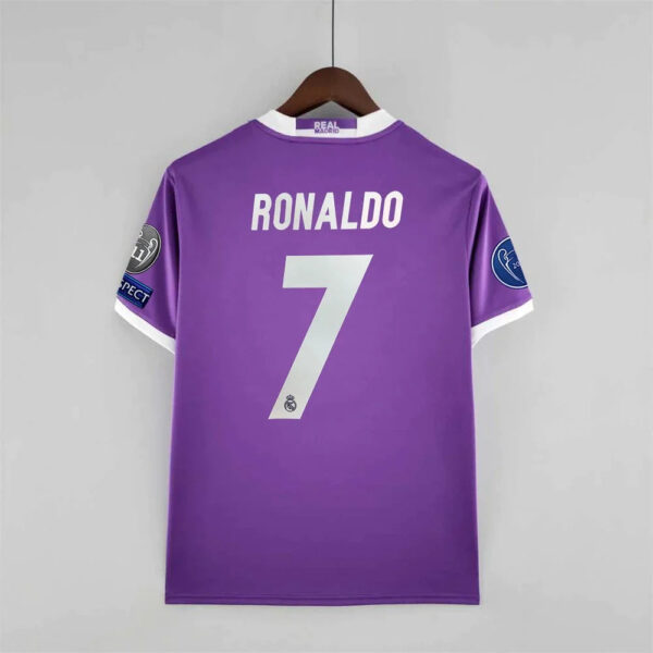 Purple Real Madrid jersey hanging, back shows 'RONALDO' and the number 7.