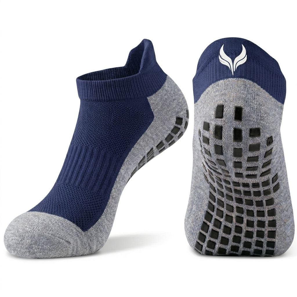5967537890642300037 | UAE SPORT STORE Pair of navy and gray grip socks with textured sole tread for indoor use, shown from the side and sole views.