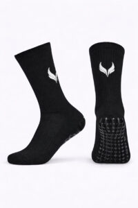 5967537890642300085 | UAE SPORT STORE Pair of black crew socks with a white wing-like logo, shown from side and bottom view against a white background.