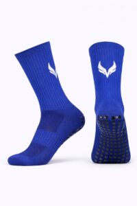 5967537890642300086 | UAE SPORT STORE Pair of royal blue athletic socks with a white leaf logo, ribbed cuffs and grippy soles displayed.