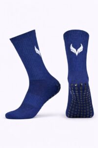 5967537890642300088 | UAE SPORT STORE Royal blue athletic socks with a white logo, showing a knit texture and non-slip grip on the sole.