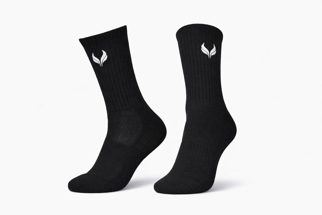 5969789690455985445 | UAE SPORT STORE Pair of black crew socks with a white brand logo near the top, displayed on a white background.