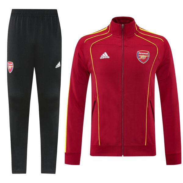 Arsenal training tracksuit: maroon zip jacket with yellow piping and crest, paired with black jogger pants bearing the club badge and Adidas logo.
