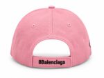 Pink baseball cap shown from the back, adjustable strap reads Balenciaga.