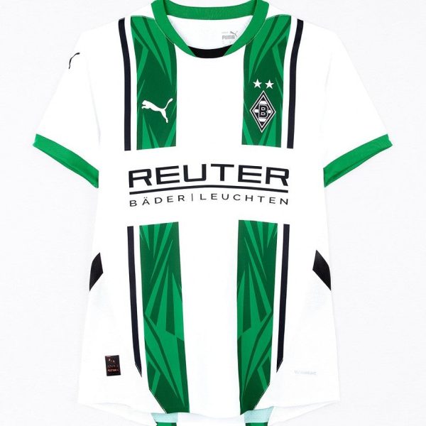 White Borussia Mönchengladbach soccer jersey with green vertical panels, Reuters sponsor, and Puma logo.