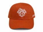 Heritage Crest luxury cap with embroidered emblem and adjustable strap. Perfect for sports fans and.