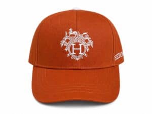 Heritage Crest luxury cap with embroidered emblem and adjustable strap. Perfect for sports fans and.