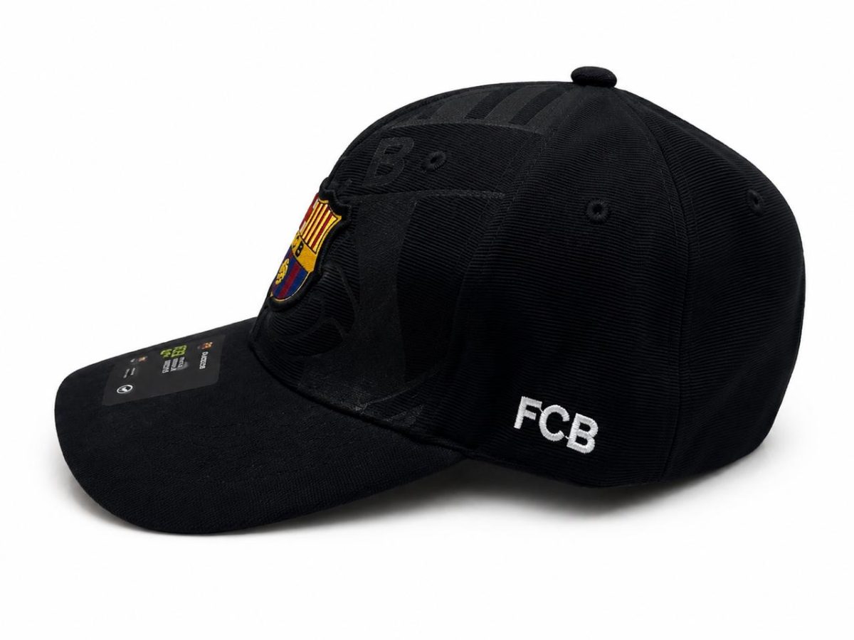 Black baseball cap featuring the FC Barcelona crest patch on the front and 'FCB' embroidered on the side.