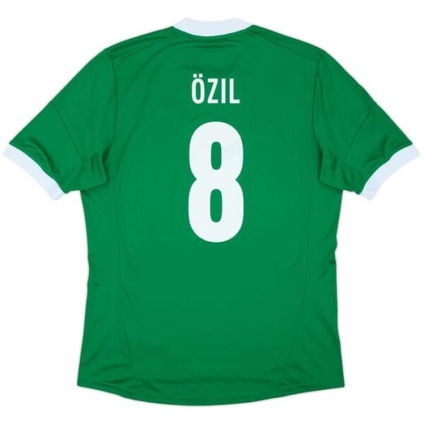 Green soccer jersey shown from the back with the name Özil and number 8 in white.