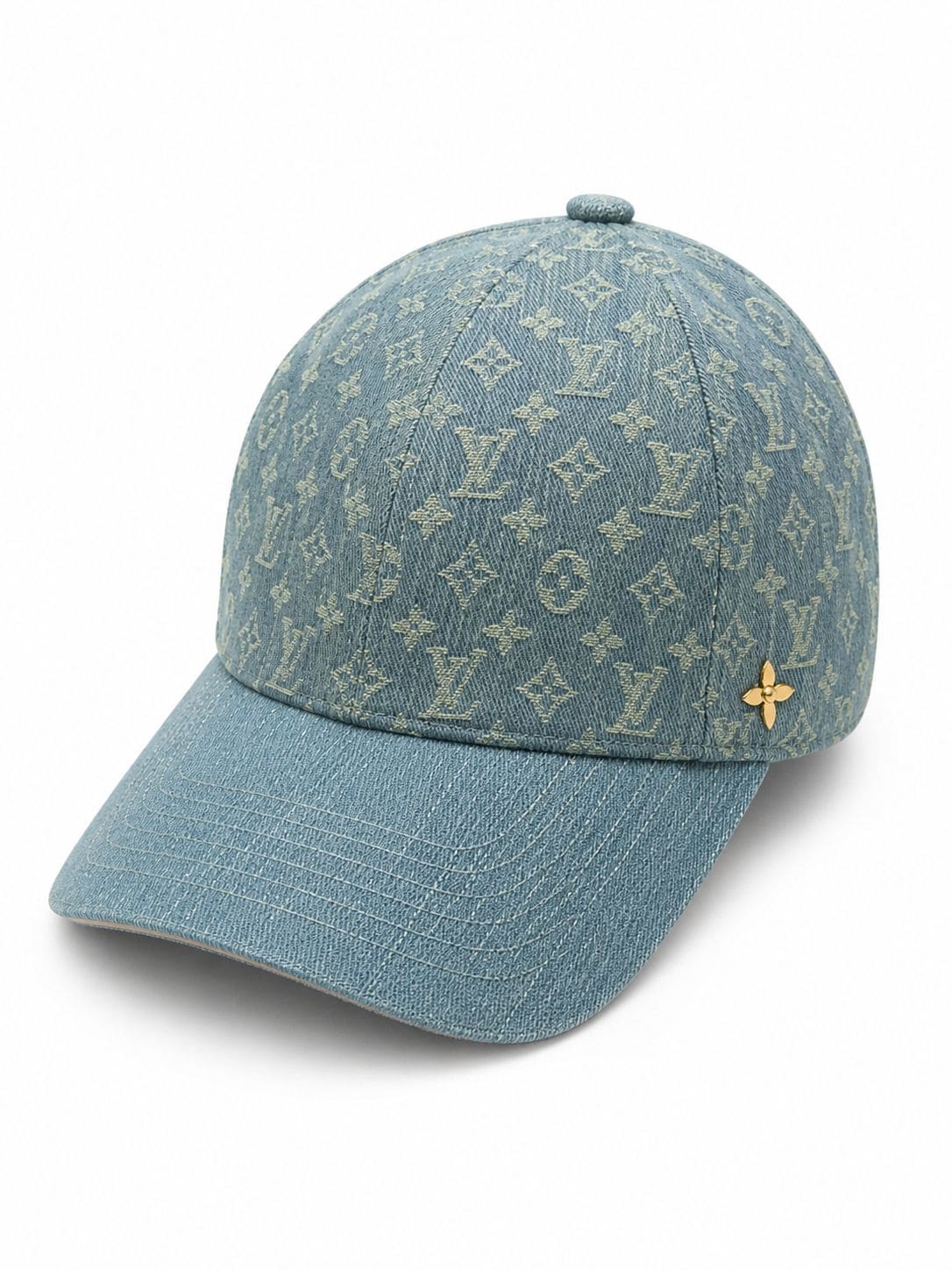 5c5e91cc-1706-4964-9be3-70df1479fe1e - UAE SPORT STORE Denim baseball cap with Louis Vuitton monogram pattern and a small gold LV flower emblem on the side.