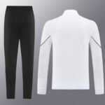 Black athletic pants with a white zipless jacket shown from the back, set of activewear for workouts with minimal detailing.