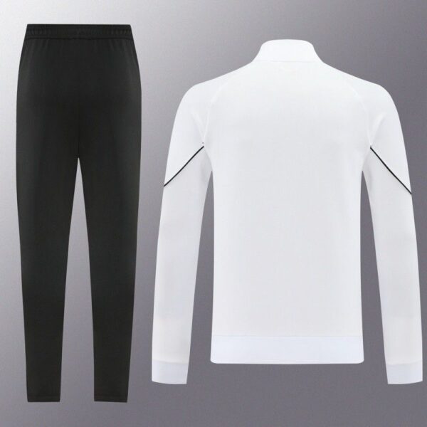 Black athletic pants with a white zipless jacket shown from the back, set of activewear for workouts with minimal detailing.