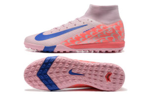 5d00fd27 | UAE SPORT STORE Pink Nike soccer cleat with a blue swoosh and pink studded sole, shown from side and bottom for product viewing