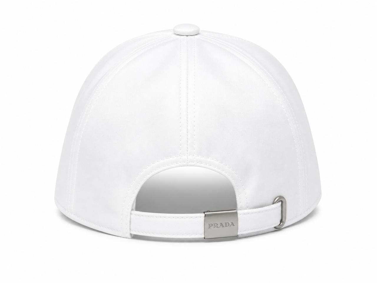 5d2fbe23-8feb-4b11-860f-cd99e47932c0 | UAE SPORT STORE White baseball cap viewed from the back with an adjustable strap and metal clasp, showcasing the Prada logo on the clasp.