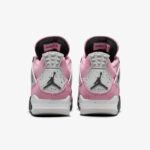 Pair of pink and gray Jordan sneakers viewed from behind, displaying speckled gray heel panels and the Jumpman logo.