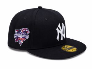 5d5aae19-754e-41e8-a7a4-e2a75a4f13ad | UAE SPORT STORE Black baseball cap with a white NY logo on the front and a World Series 2000 patch on the left side.