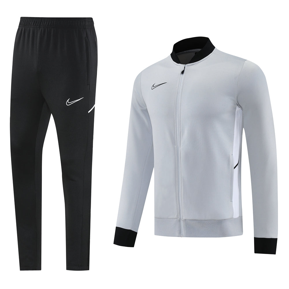 5d81dbb5 Nike men's athletic track pants in black with white swoosh and matching light gray zip-up jacket with black cuffs—product set