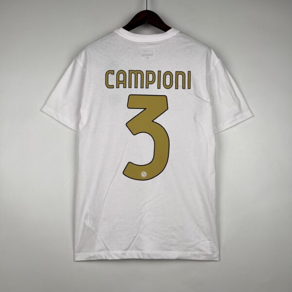 White T-shirt on a hanger with 'CAMPIONI' lettering visible on the back and a large gold number 3 below.