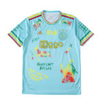 Light blue Ziggo soccer jersey with multicolor graffiti designs and striped cuffs on sleeves