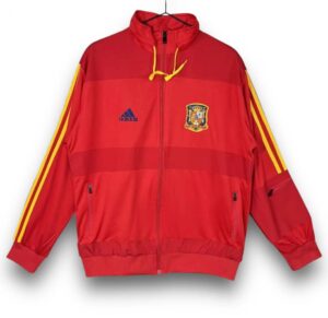 Red Adidas Spain jacket with yellow sleeve stripes, crest on the left chest, and zip front (front view).