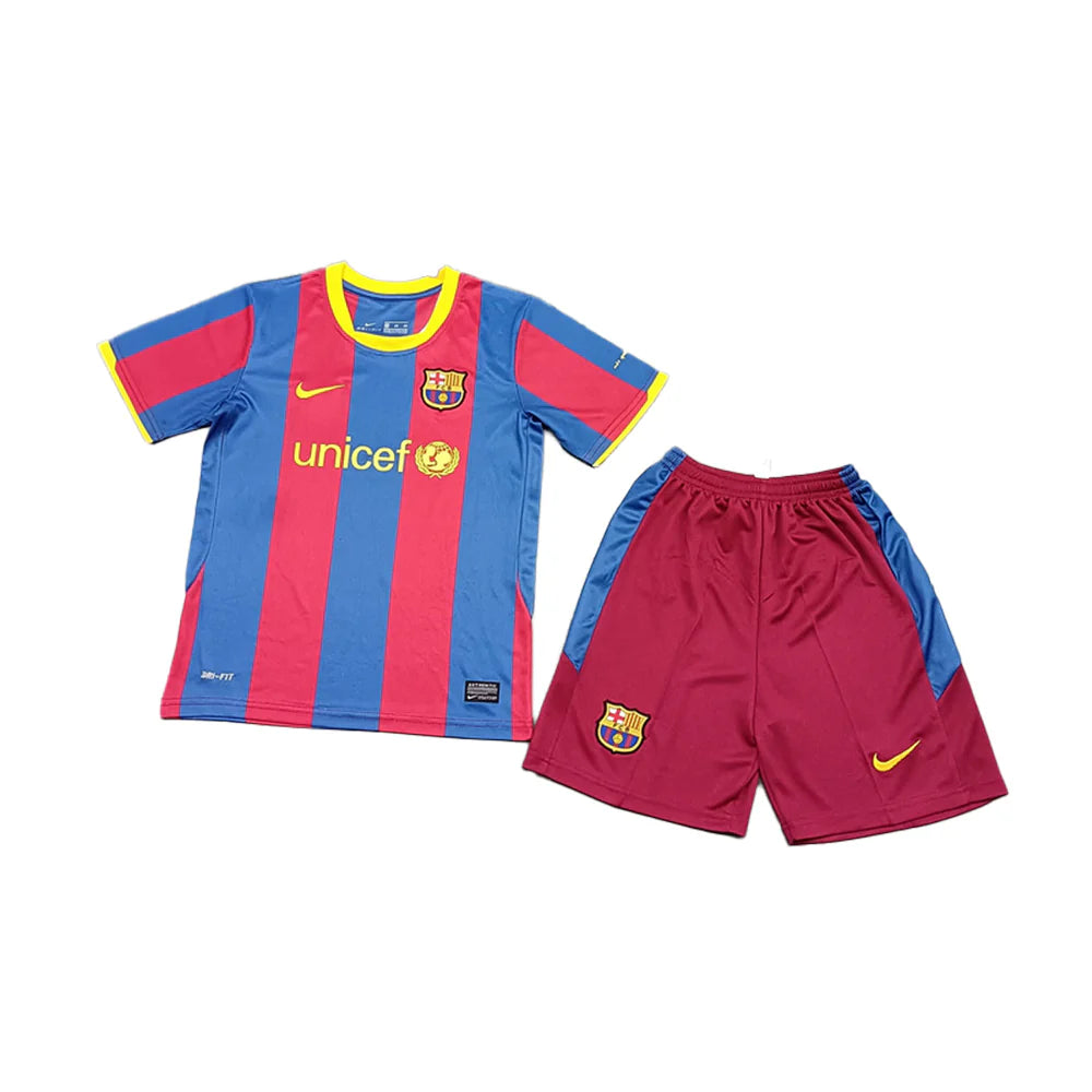 5ebe1ac97b50303428300f3a5a596c2c Barcelona football kit: blue and red striped jersey with UNICEF logo and club crest, paired with maroon shorts with blue side panels and a yellow Nike swoosh.