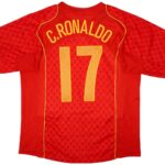 Red soccer jersey shown from the back with the name 'C. Ronaldo' and the number 11 in yellow on a red patterned shirt.
