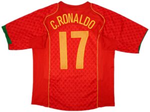 Red soccer jersey shown from the back with the name 'C. Ronaldo' and the number 11 in yellow on a red patterned shirt.