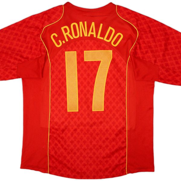 Red soccer jersey shown from the back with the name 'C. Ronaldo' and the number 11 in yellow on a red patterned shirt.