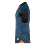 5k | UAE SPORT STORE Side view of a blue tree-patterned soccer jersey with black sleeve cuffs and orange lettering.