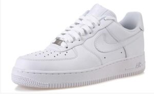 White Nike Air Force 1 low-top sneakers shown in a side-three-quarter view
