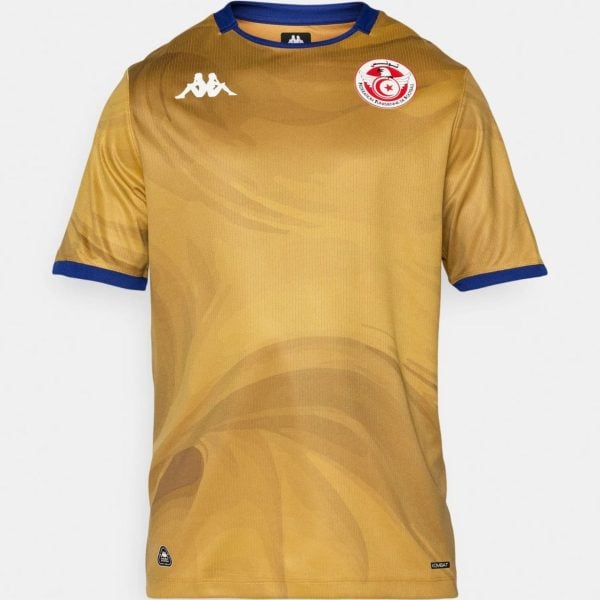 Gold soccer jersey with blue trim on collar and sleeves, featuring a white Kappa logo on the left chest and the Tunisian Football Federation crest on the right.