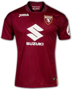 Torino FC maroon football jersey with Suzuki sponsor logo on the chest and Joma branding on the shoulders.