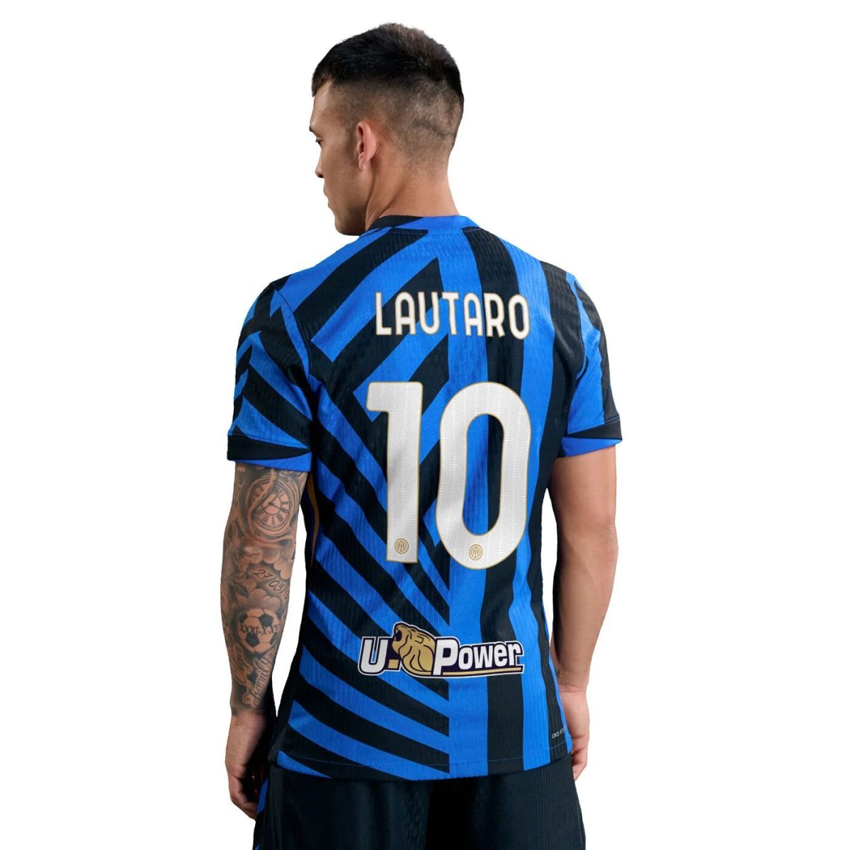 Back view of a blue and black striped soccer jersey with the name 'LAUTARO' and the number 10 on the back; sponsor patch near the bottom.