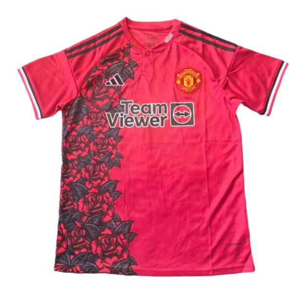 Red Manchester United football jersey featuring a floral left panel and TeamViewer sponsor logo across the chest ( Adidas stripes on shoulders ).