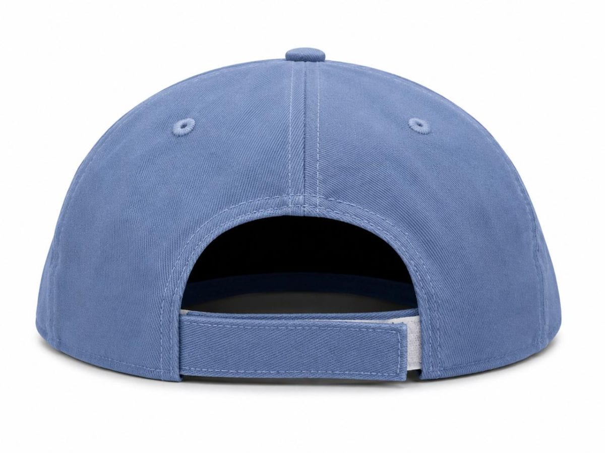 Back view of a light blue baseball cap with an adjustable strap and rear opening.