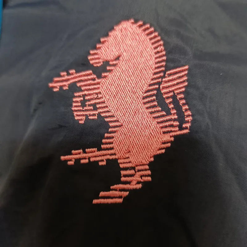 6737268c61eec90e | UAE SPORT STORE Pink seahorse embroidery on dark fabric