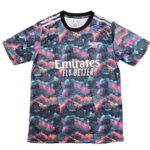 Bright, multicolor patterned crew-neck T-shirt with Emirates Fly Better across the chest.