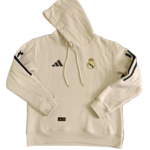 Cream Real Madrid hoodie with hood, kangaroo pocket, Adidas logo, and Real Madrid crest on chest.